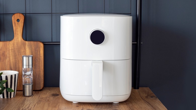 white air fryer on shelf