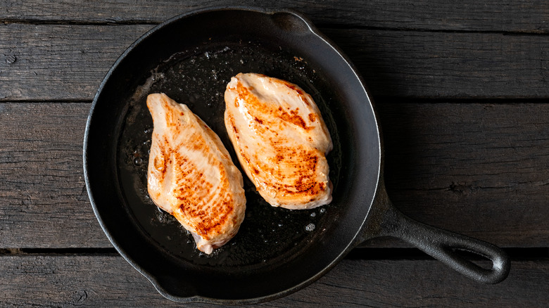 Seared chicken in skillet