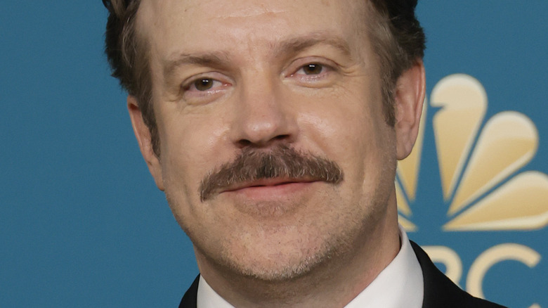 Jason Sudeikis with slight smirk