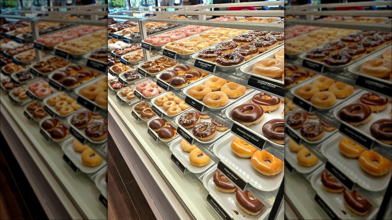 Krispy Kreme donuts in case