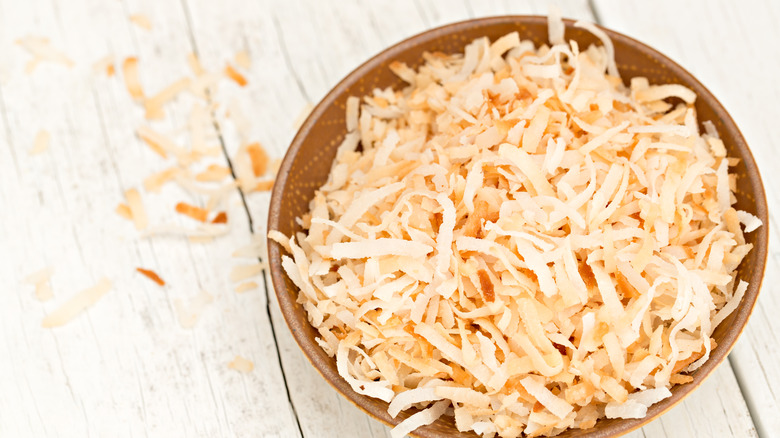 Bowl of toasted shredded coconut