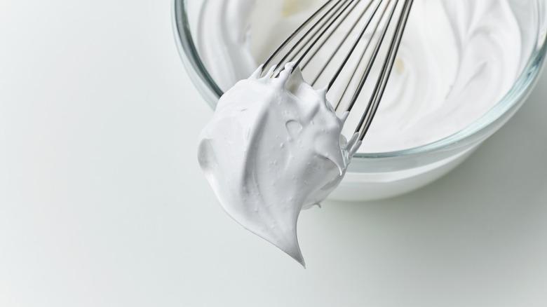 Whipped cream on a whisk