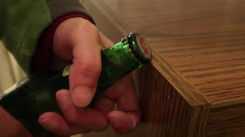 Beer bottle on countertop corner