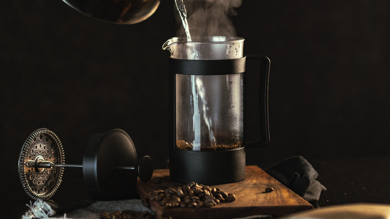 pouring water into French press