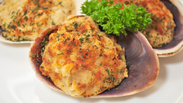 Stuffed breaded baked clams garnished with parsley