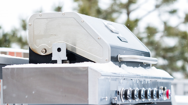 Grill covered in snow