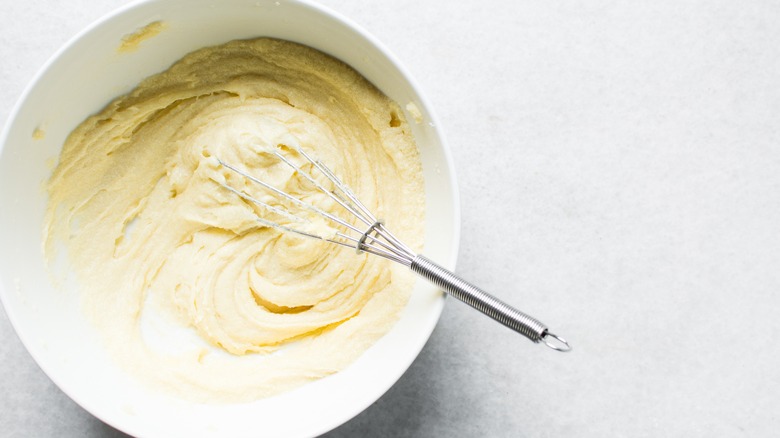 hand whisk creaming butter and sugar