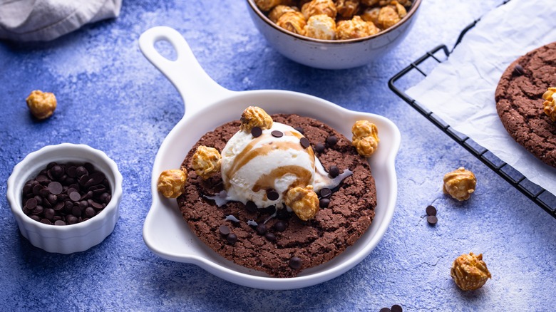 Cookie baked in enamel skillet on countertop