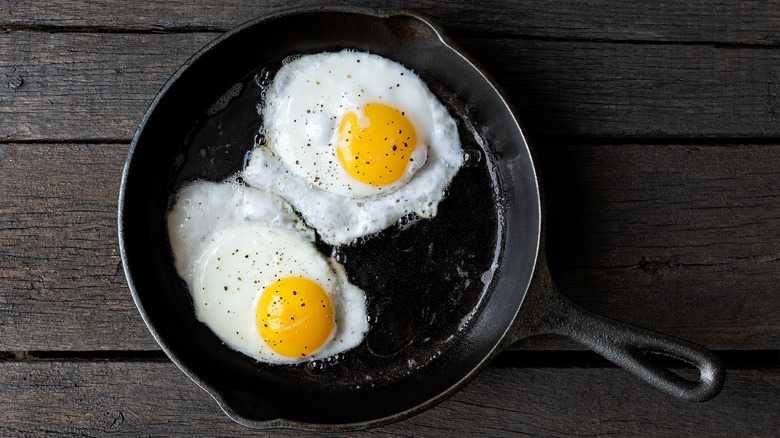 fried eggs in cast iron