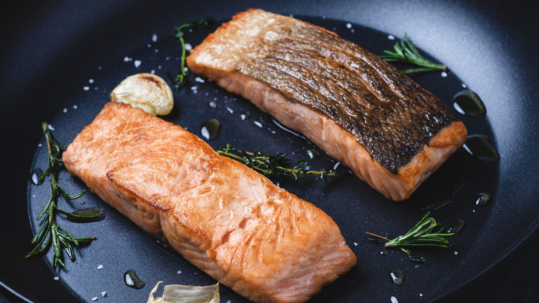 salmon cooking in nonstick pan