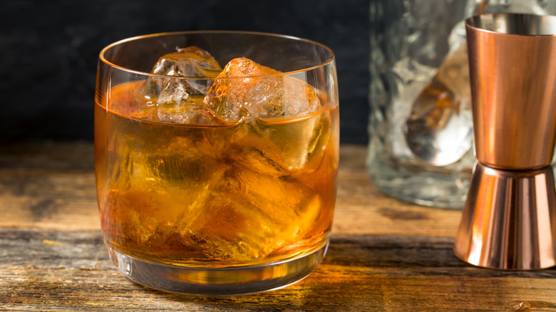 Freshly-made French Connection cocktail in a glass with ice cubes