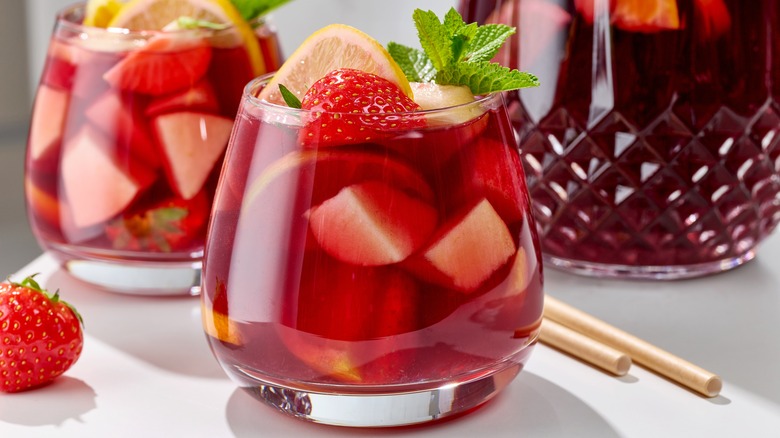 Red sangria in glasses with fruit