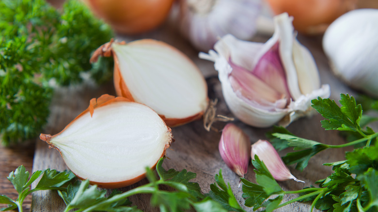 garlic and onion sliced in half