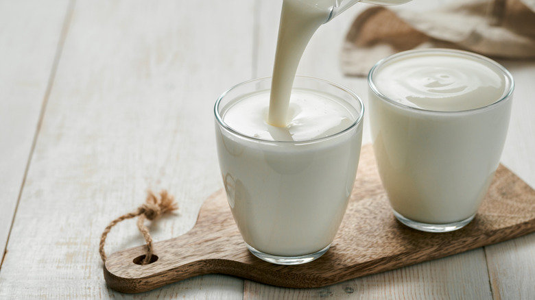 Kefir being poured into glasses