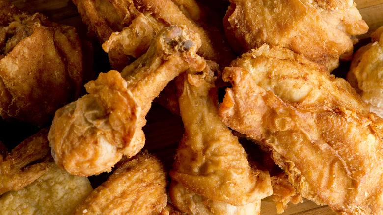 Fried chicken on a wooden board