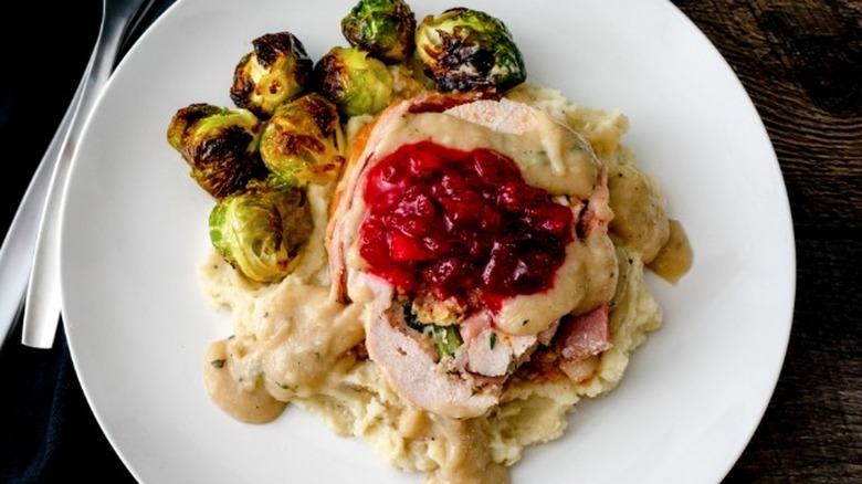 serving of turkey potatoes and brussels sprouts