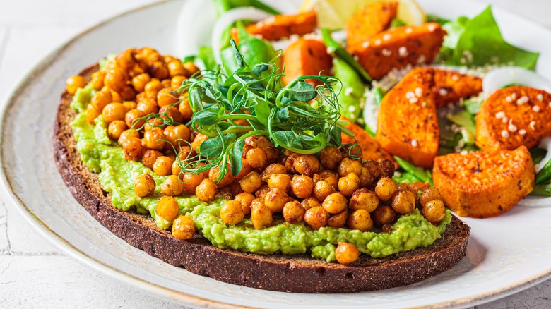 Crispy chickpeas on avocado toast