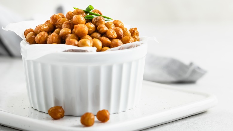 Crispy chickpeas in ramekin with chives