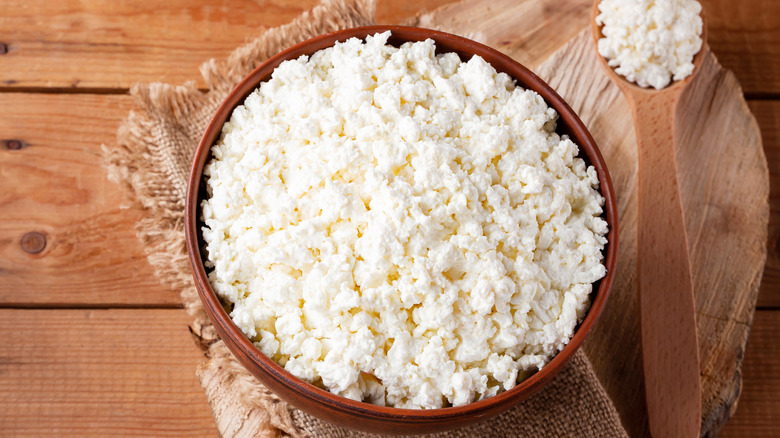 Cottage cheese in brown bowl