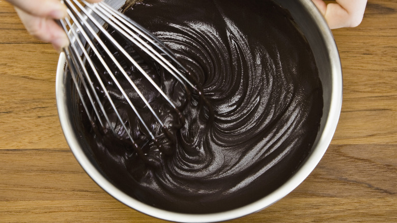 Whisking ganache in metal bowl