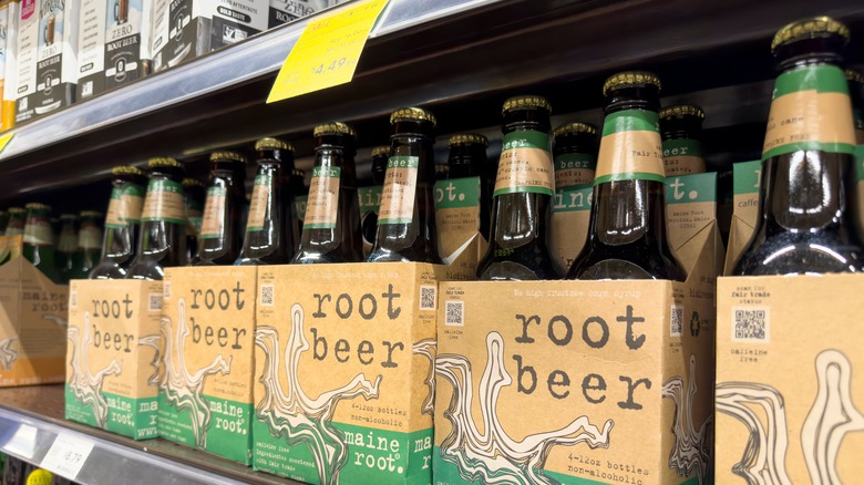 Root beer cases on shelves