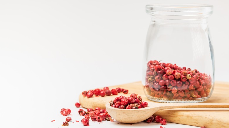 Jar of pink peppercorns