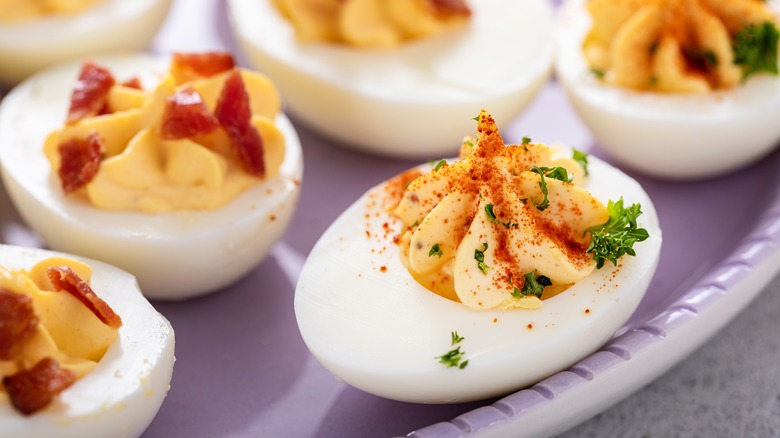 deviled eggs with bacon and paprika