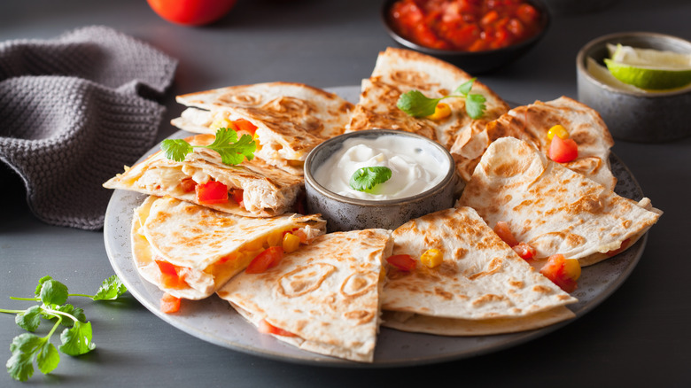 sliced quesadilla on a plate