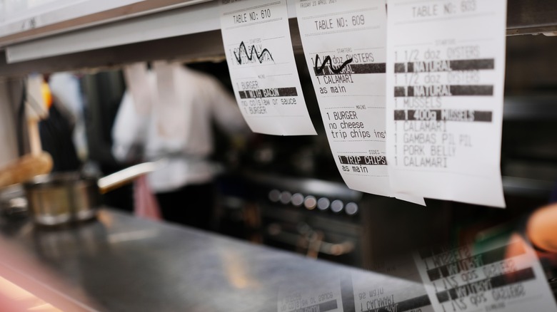 order slips in restaurant kitchen