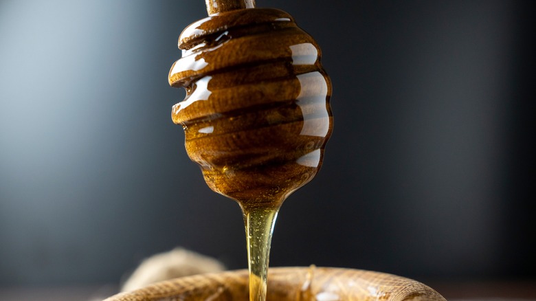 Honey flowing off a stick