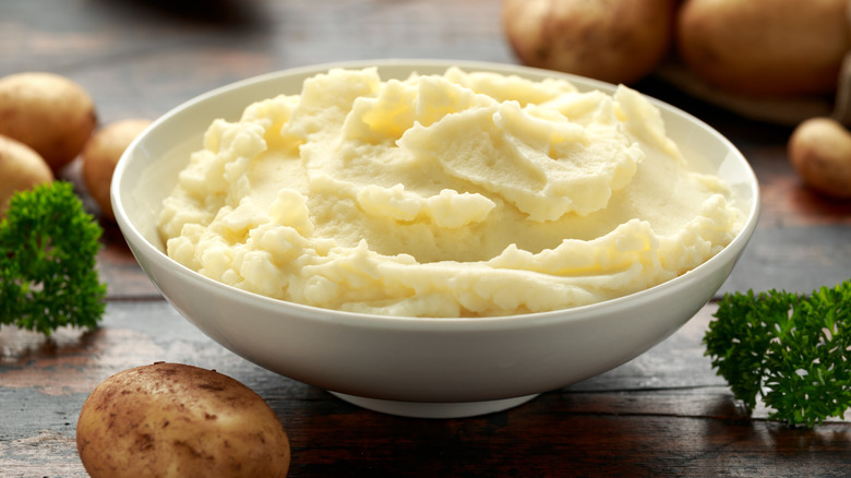 Mashed potatoes in white bowl