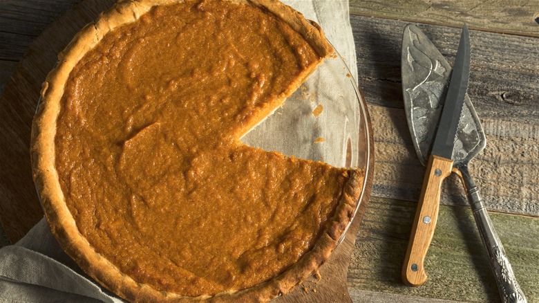 Sweet potato pie with slice removed 