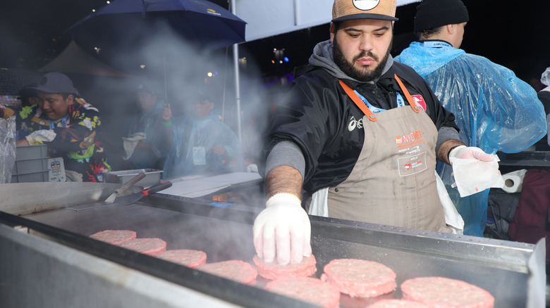 Burger patties cooking