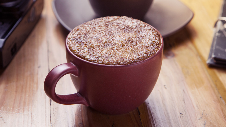 creme brulee latte in red mug