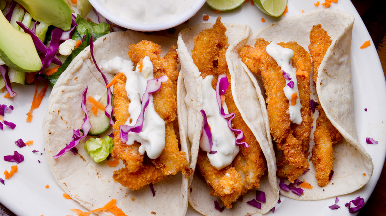 breaded fish tacos with toppings