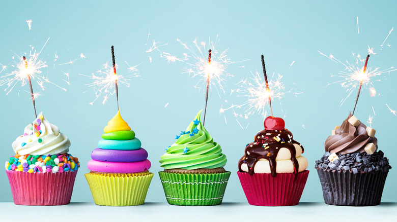 colorful cupcakes with sparklers