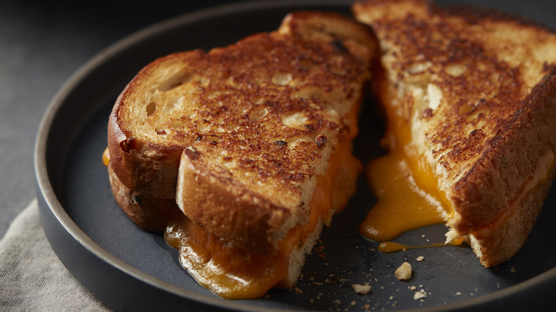 A grilled cheese sandwich in a pan