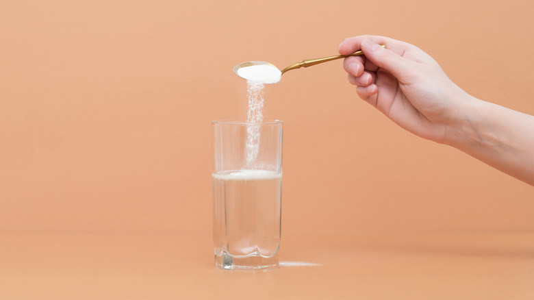 collagen powder poured into drink