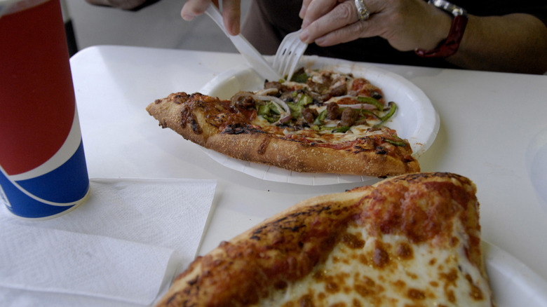 Costco pizza on a paper plate