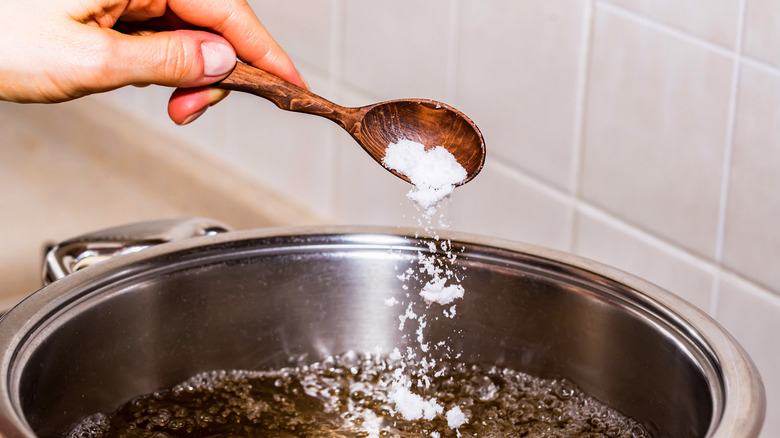 salt being added to pot