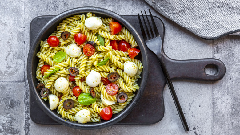 pasta salad with bocconcini, tomatoes and olives