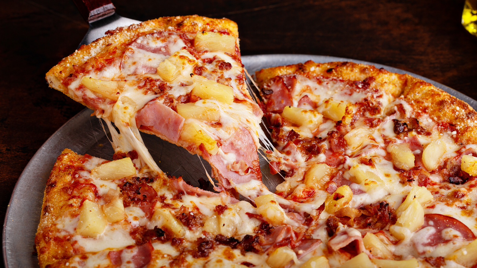 You've Heard Of Pineapple On Pizza, But What About Pizza On Pineapple?