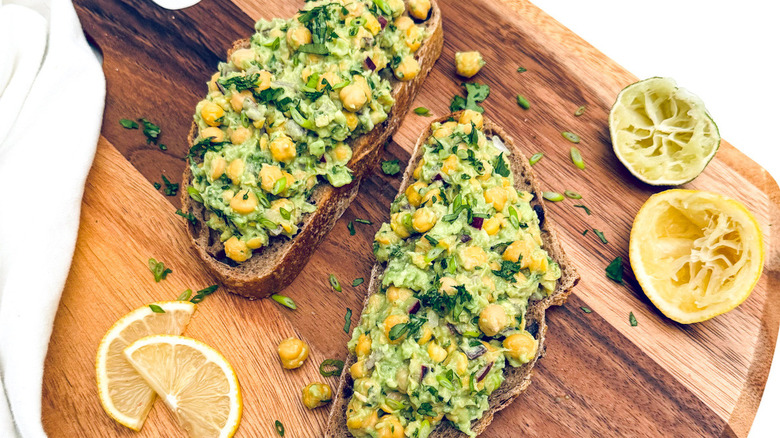 chickpea avocado toast on cutting board