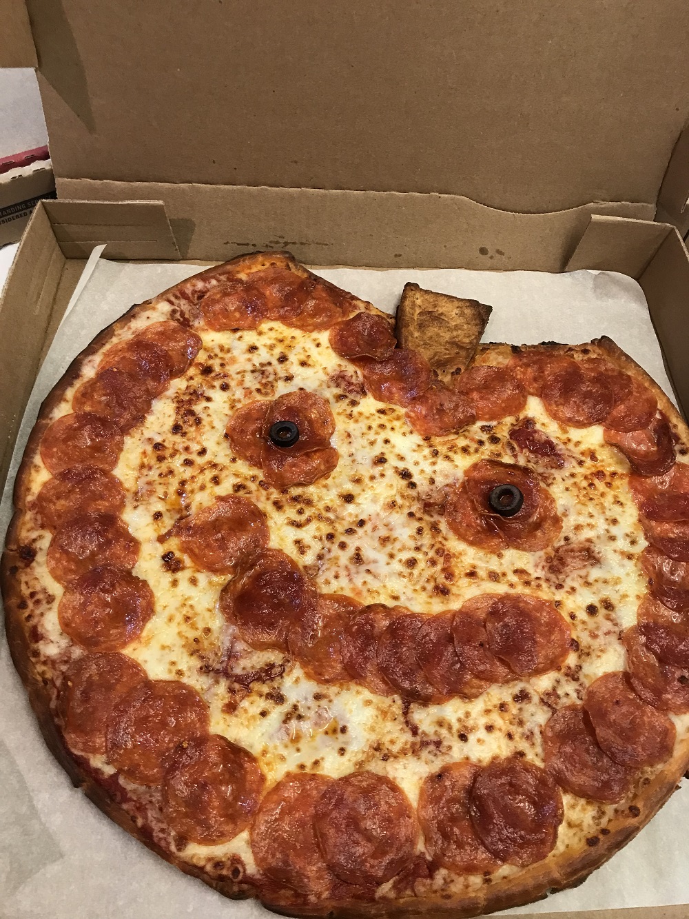 Papa John’s JackO’Lantern Pizza Is the Cutest, Spookiest Halloween Dinner